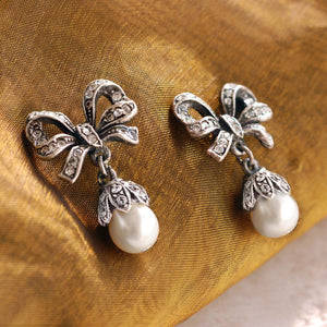 Crystal Bow Pearl Earrings E1265 - Sweet Romance Wholesale